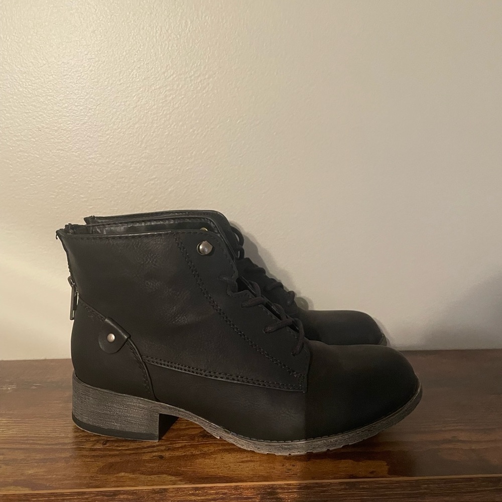 Black leather heeled booties